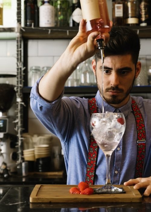 barman-is-making-cocktail-at-night-club-.jpg